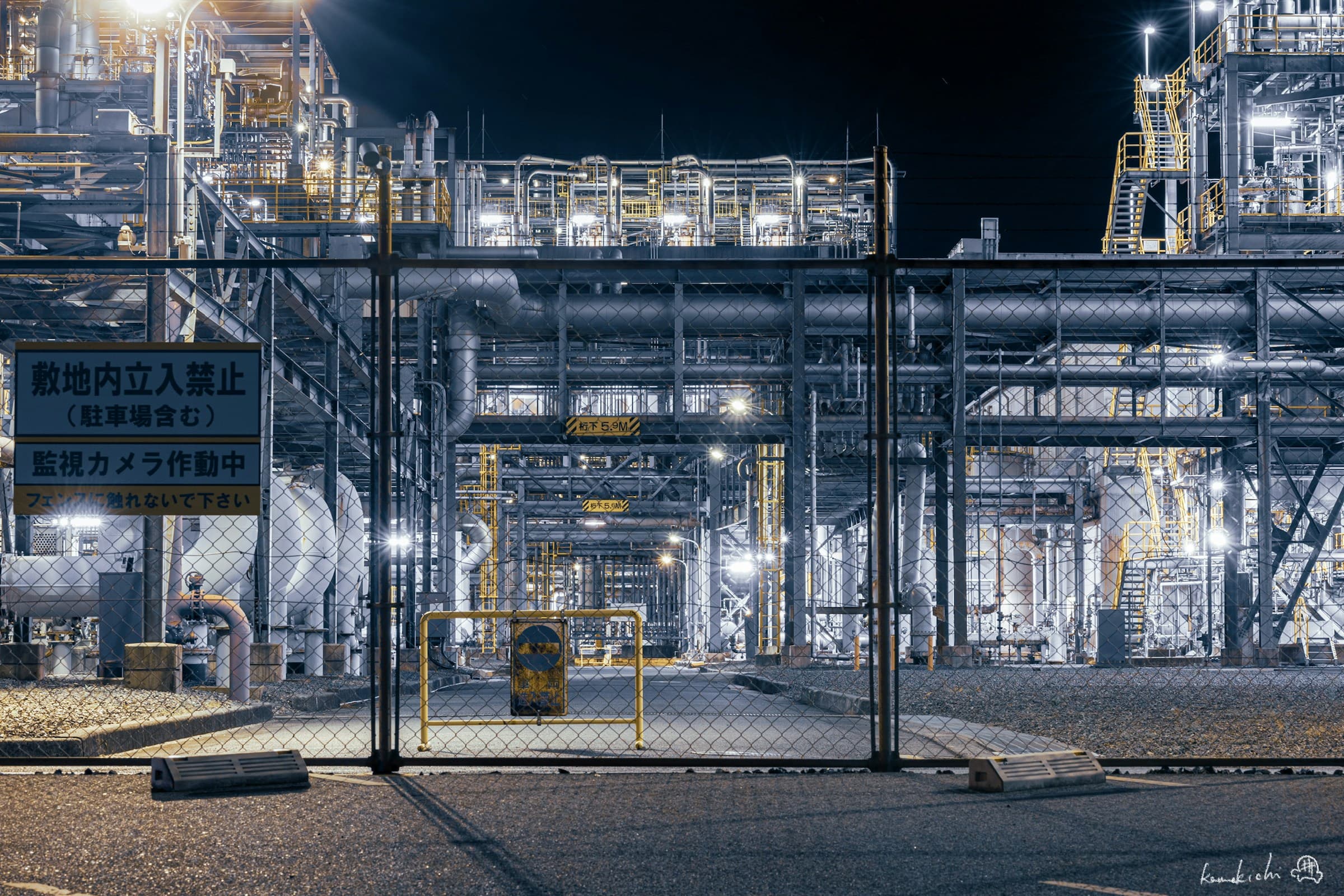 Industrial process facility illuminated at night